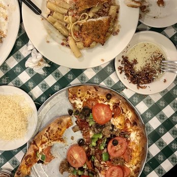 Johnny Carino's - Johnnys Favorite Pizza and Parmesan Rigatoni - Italian Near Me - Downey, California Johnny Carino's - Johnnys Favorite Pizza and Parmesan Rigatoni - Italian Near Me - Downey, California