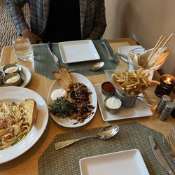 POM Restaurant - (left to right) shrimp fettucine limóne, roasted beets and burrata cheese, truffle-parmesan fries