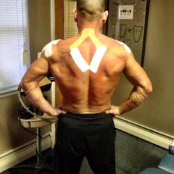 Art Of Touch Health And Wellness Center - Improve stamina and strength while reducing pain, edema and recovery time using Rock Tape or Kinesiotape applied by a trained professional.