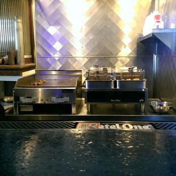 Tracker's Pub and Grub - The grill area. - Pubs Near Me - South Milwaukee, Wisconsin