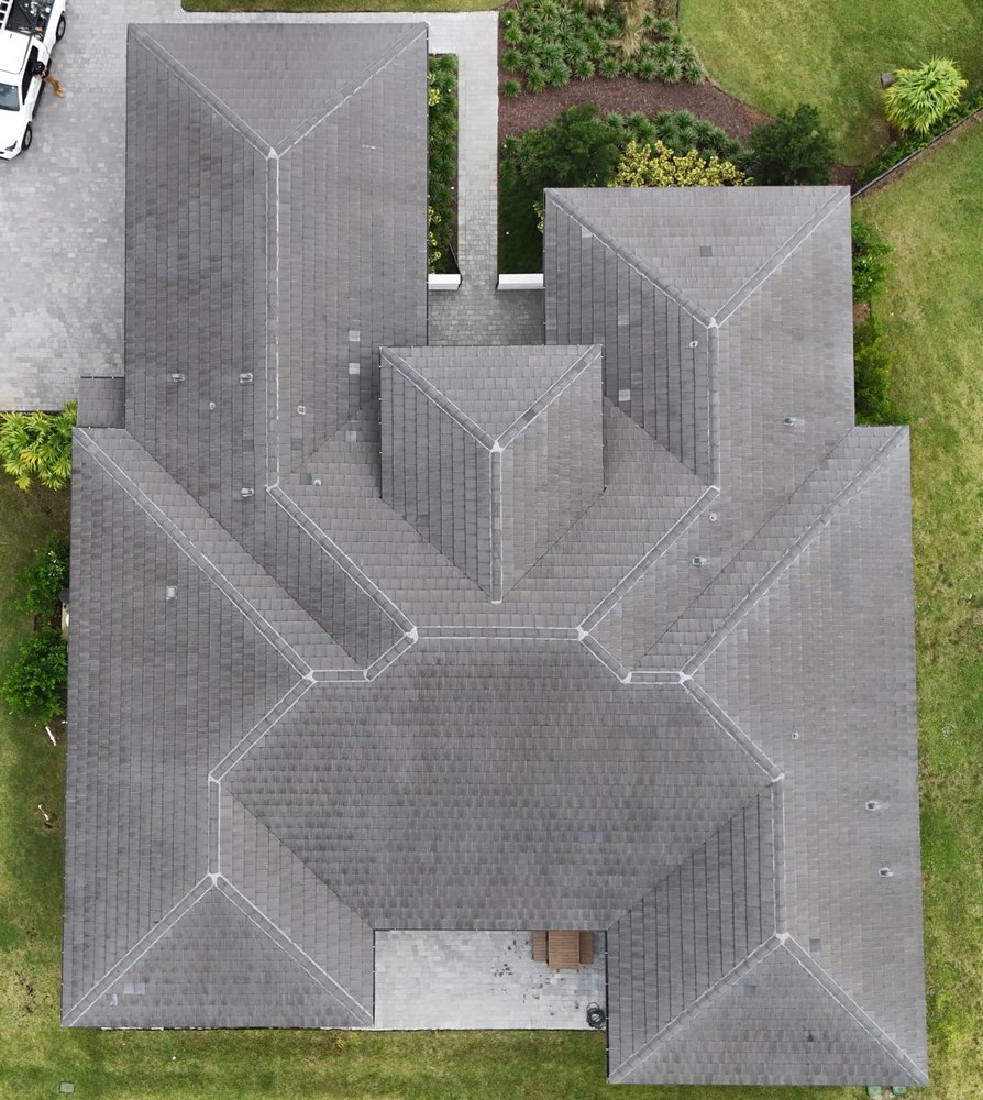 Slide of E&S Roofing