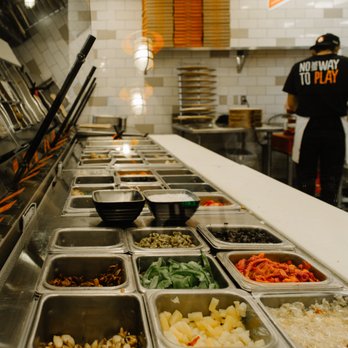 Blaze Pizza - a line of trays of food - Pizza Near Me - Westminster, Maryland Blaze Pizza - a line of trays of food - Pizza Near Me - Westminster, Maryland