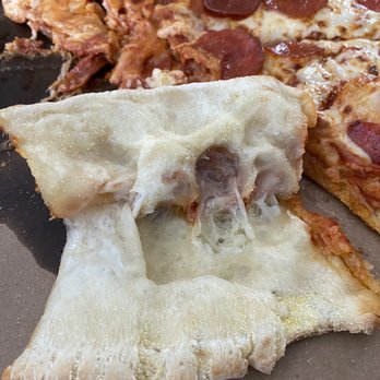 Domino's Pizza - a slice of pepperoni pizza - Pizza Near Me - Canyon Lake, California