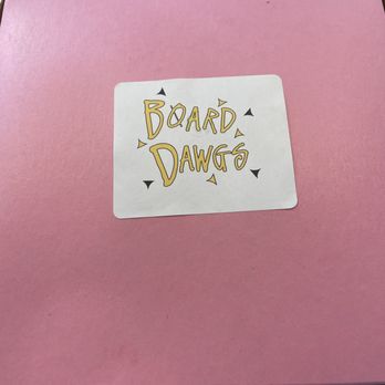 Board Dawgs - a pink box with a sticker that says board dawgs - Specialty Food Near Me - Santa Barbara, California