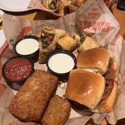 Triple Appetizer: mozzarella sticks, southwestern egg rolls, and Big Mouth bites (hamburgers)