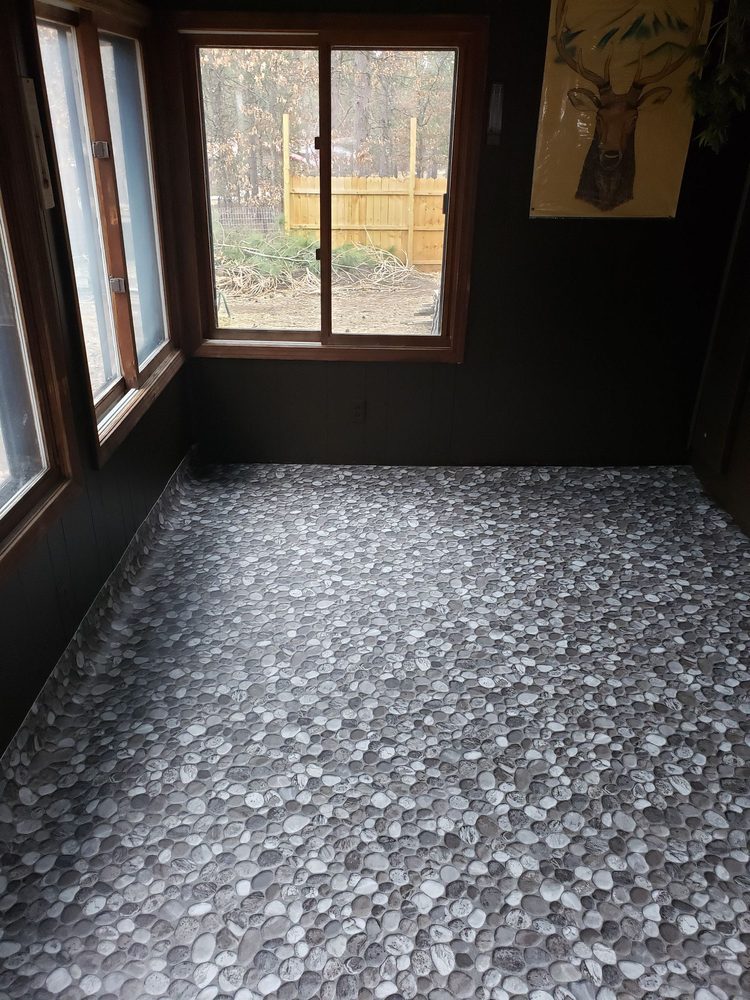 WORLD OF FLOORS Updated May 2024 207 S James St, Grayling, Michigan