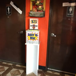 a refrigerator with a sign on it