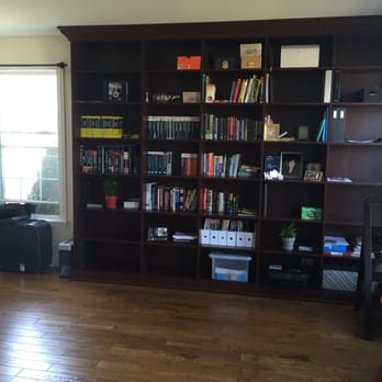 Chicagoland Home Products - Custom floor-to-ceiling book shelving. African walnut. - Shades & Blinds Near Me - Melrose Park, Illinois