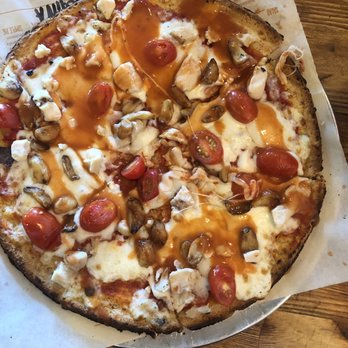 Blaze Pizza - Cauliflower pizza crust with regular pizza sauce, mozzarella, tomatoes, garlic, grilled chicken and topped with buffalo sauce - Salad Near Me - Davie, Florida Blaze Pizza - Cauliflower pizza crust with regular pizza sauce, mozzarella, tomatoes, garlic, grilled chicken and topped with buffalo sauce - Salad Near Me - Davie, Florida
