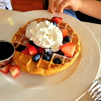 Cala Luna - Belgian Waffle with Whipped Cream and Berries - Italian Near Me - Mineola, New York Cala Luna - Belgian Waffle with Whipped Cream and Berries - Italian Near Me - Mineola, New York