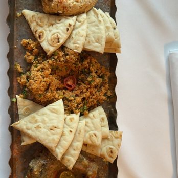 Red Onion Organic - Tapas platter (from top to bottom): hummus, Tabuli, Babagannouj - Mediterranean Near Me - Destin, Florida Red Onion Organic - Tapas platter (from top to bottom): hummus, Tabuli, Babagannouj - Mediterranean Near Me - Destin, Florida