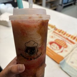 Chunky strawberry and peach tea with boba