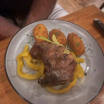 Spettro - Pork chop with polenta croquettes - Italian Near Me - Arlington, New York Spettro - Pork chop with polenta croquettes - Italian Near Me - Arlington, New York