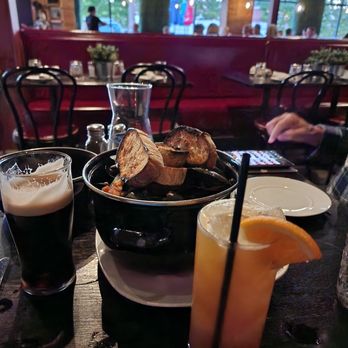 Pier 131 Kitchen + Bar - Muscles bucket, Guinness, Island of Misfits drink. - New American Near Me - Shelton, Connecticut Pier 131 Kitchen + Bar - Muscles bucket, Guinness, Island of Misfits drink. - New American Near Me - Shelton, Connecticut