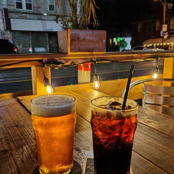 The Green Dragon - two drinks on a wooden table - Chicken Wings Near Me - Toronto, Ontario The Green Dragon - two drinks on a wooden table - Chicken Wings Near Me - Toronto, Ontario