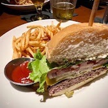 J. Alexander's - Huge burger. This is only 1/2! - New American Near Me - Ft. Lauderdale, Florida J. Alexander's - Huge burger. This is only 1/2! - New American Near Me - Ft. Lauderdale, Florida