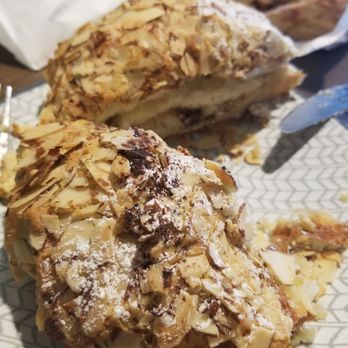 Royal Bakehouse - Chocolate almond croissant filled with delicious almond paste - Coffee & Tea Near Me - Bellevue, Washington