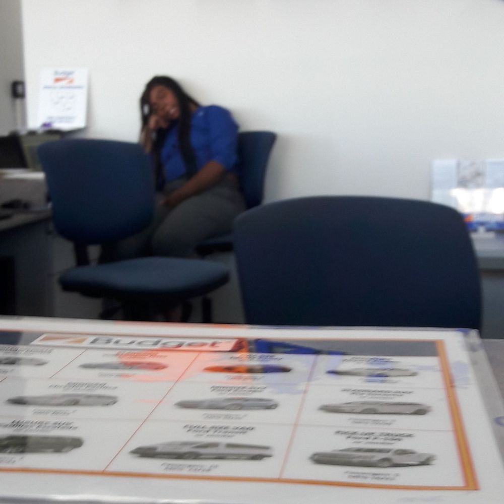 Budget - An employee sleeping while the other employees dont do anything ro help. - Car Rental Near Me - Las Vegas, Nevada
