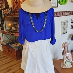 Titi & Tata Thrift Boutique - Refresh your look with high-fashion new and used clothes and accessories at our thrift boutique.
