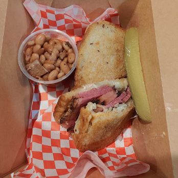 Memphis Minnie's - Reuben sandwich with pit smoked beans side & pickle - Barbeque Near Me - San Francisco, California Memphis Minnie's - Reuben sandwich with pit smoked beans side & pickle - Barbeque Near Me - San Francisco, California