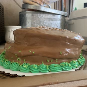 Walmart Supercenter - a chocolate cake with green frosting - Department Stores Near Me - Pearland, Texas