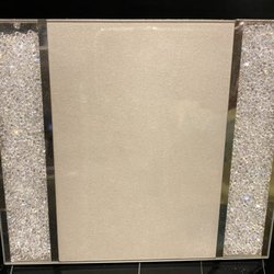 Swarovski - Missing crystals on the left side of the frame now creates a gap to the rim