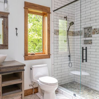 Kaizen Homes - a bathroom with a toilet, sink, and shower - General Contractors Near Me Kaizen Homes - a bathroom with a toilet, sink, and shower - General Contractors Near Me