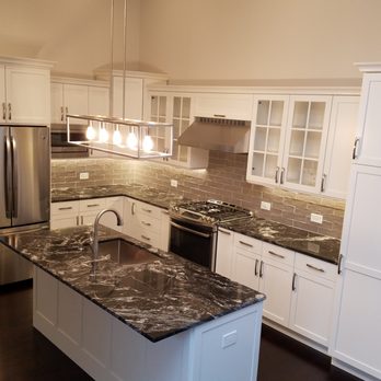 Landmark Home Improvements - a kitchen with granite counter tops - General Contractors Near Me Landmark Home Improvements - a kitchen with granite counter tops - General Contractors Near Me