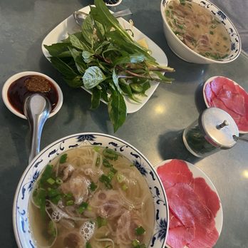 Pho Tri Vietnamese Restaurant - #18 meat outside with tendon. The tendon was soft!!! Medium bowl (bottom), and Large bowl (top). We love this place!!! - Vietnamese Near Me - Honolulu, Hawaii Pho Tri Vietnamese Restaurant - #18 meat outside with tendon. The tendon was soft!!! Medium bowl (bottom), and Large bowl (top). We love this place!!! - Vietnamese Near Me - Honolulu, Hawaii