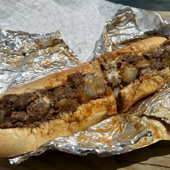 Pip's Dock Street Dogs - Large steak with white American, sautéed onions, red hots and hot sauce. - Hot Dogs Near Me - Annapolis, Maryland