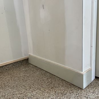 Lang Ventures - the corner of a room with a white refrigerator - General Contractors Near Me Lang Ventures - the corner of a room with a white refrigerator - General Contractors Near Me