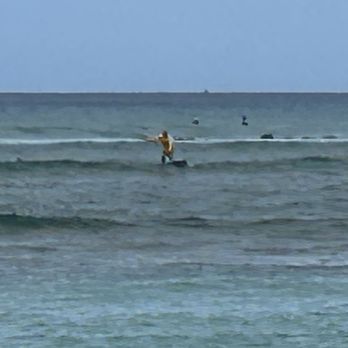 Shaka Surfing Academy - That's us with Matt in the ocean, learning to surf for the first time in our lives - Surf Schools Near Me - Honolulu, Hawaii Shaka Surfing Academy - That's us with Matt in the ocean, learning to surf for the first time in our lives - Surf Schools Near Me - Honolulu, Hawaii