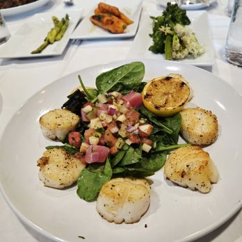 Griffin's Steakhouse - Seared scallops Background side orders or asparagus, roasted carrots and broccolini - Steakhouses Near Me - Martinez, Georgia Griffin's Steakhouse - Seared scallops Background side orders or asparagus, roasted carrots and broccolini - Steakhouses Near Me - Martinez, Georgia