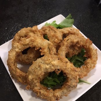 TJ'S At The Old Forge - House battered onion rings - Steakhouses Near Me - Bandera, Texas TJ'S At The Old Forge - House battered onion rings - Steakhouses Near Me - Bandera, Texas