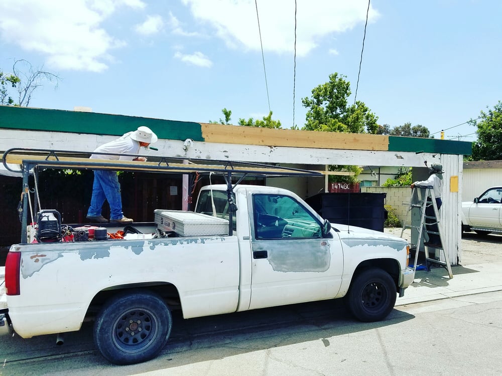 Slide of Mario's Roofing Services