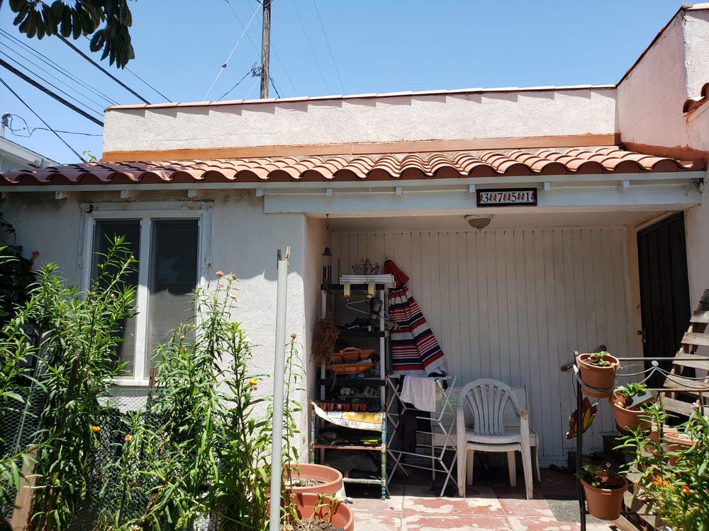 Slide of Trujano Roofing