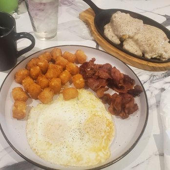 Myth Gastrobar - Eggs, bacon, biscuit and gravy, tots. - Breakfast & Brunch Near Me - Wilton Manors, Florida Myth Gastrobar - Eggs, bacon, biscuit and gravy, tots. - Breakfast & Brunch Near Me - Wilton Manors, Florida
