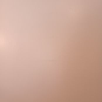 Speedy Gonzalez - A solid, light-colored wall with a uniform surface and no visible decorations, furniture, or other objects. The wall appears clean and evenly painted, with no distinguishing marks or features. - General Contractors Near Me