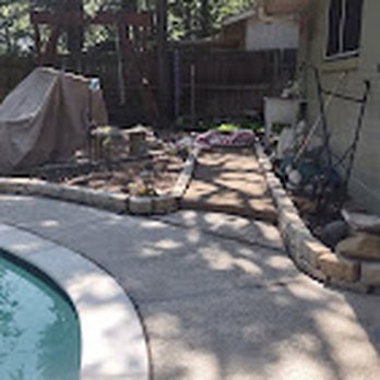 Green Scape Landscape - a backyard with a swimming pool - Landscaping Near Me