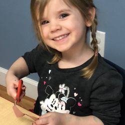 La Petite Ecole - Working on fine motor skills.  Even toddlers learn how to use scissors at La Petite Ecole!