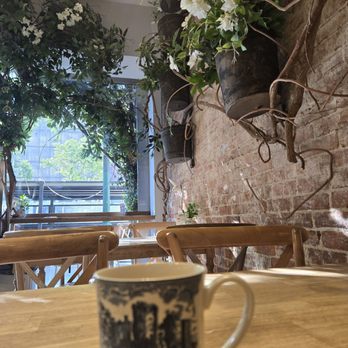 maman - Inside & mug of drip coffee - Cafes Near Me - New York, New York maman - Inside & mug of drip coffee - Cafes Near Me - New York, New York