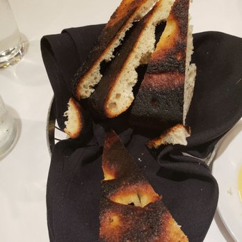 Lugano Ristorante - Second batch of bread because the first batch was burnt...as you can tell, they were still burnt and they were also stale. - Italian Near Me - Cary, North Carolina Lugano Ristorante - Second batch of bread because the first batch was burnt...as you can tell, they were still burnt and they were also stale. - Italian Near Me - Cary, North Carolina