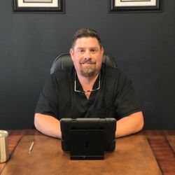 Dover Chiropractic - Dr. Dover at his desk.