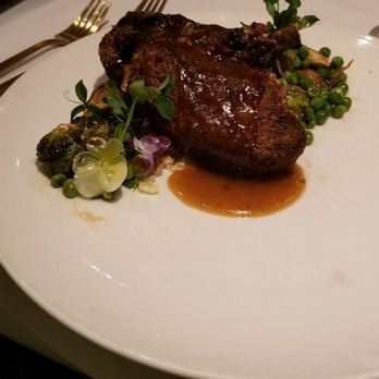 Bodhi Thai Dining - Duck - roasted cauliflower, fried Brussels sprouts, English peas, atop holy basil sauce - Thai Near Me - Lexington, South Carolina Bodhi Thai Dining - Duck - roasted cauliflower, fried Brussels sprouts, English peas, atop holy basil sauce - Thai Near Me - Lexington, South Carolina