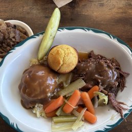 Pot Roast, mash potatoes, vegetables and side of cabbage. Corn bread muffin. Pot Roast, mash potatoes, vegetables and side of cabbage. Corn bread muffin.
