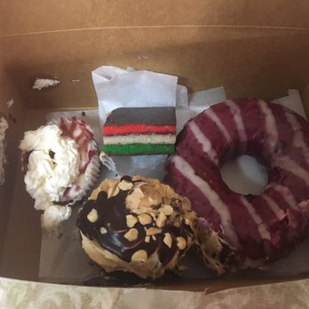 Papa Ganache - Raspberry cheesecake cup, rainbow cookie, raspberry donut, and peanut butter cream cupcake - Cupcakes Near Me - Cranford, New Jersey Papa Ganache - Raspberry cheesecake cup, rainbow cookie, raspberry donut, and peanut butter cream cupcake - Cupcakes Near Me - Cranford, New Jersey