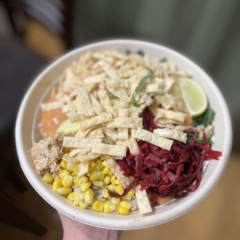 Freshii - a person holding a bowl of food - Salad Near Me - Etobicoke, Ontario Freshii - a person holding a bowl of food - Salad Near Me - Etobicoke, Ontario