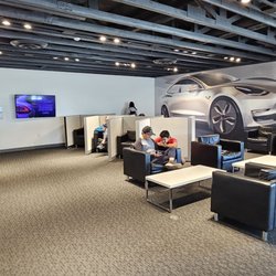 Tesla Supercharger - lounge chairs in the Tesla Lounge