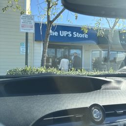 People waiting outside waiting for them to open