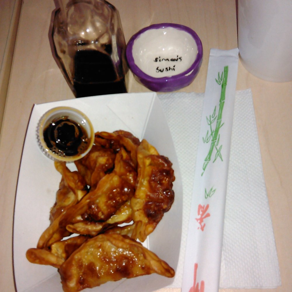 Simon's Sushi - a plate of chicken wings and dipping sauce - Sushi Bars Near Me - Cedar Park, Texas Simon's Sushi - a plate of chicken wings and dipping sauce - Sushi Bars Near Me - Cedar Park, Texas